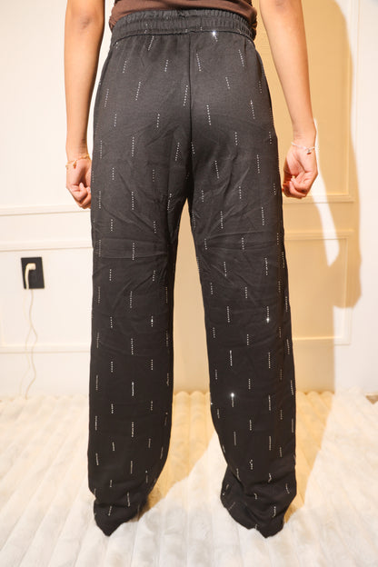 5180 pantalon liso con pedreria negro